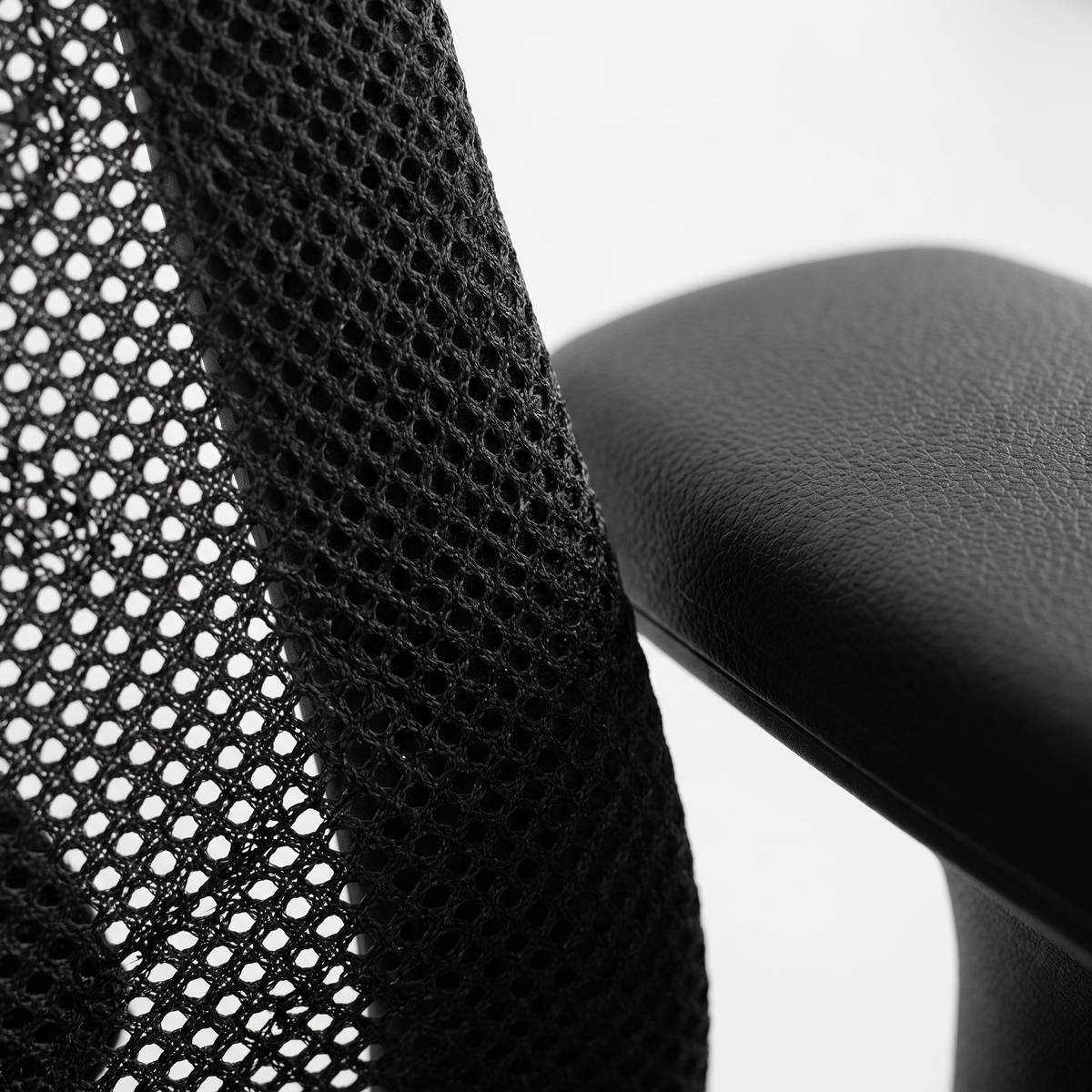 Pro Mesh Office Chair — mesh and armrest detail