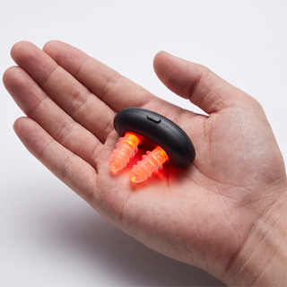 Red-Light Nasal Device — in the palm of a hand